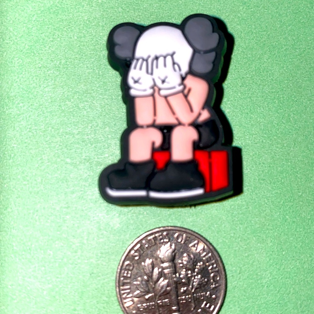 (10 for $15) KAWS Hypebeast Covering His Face & Sitting Down Crocs Shoe Charms